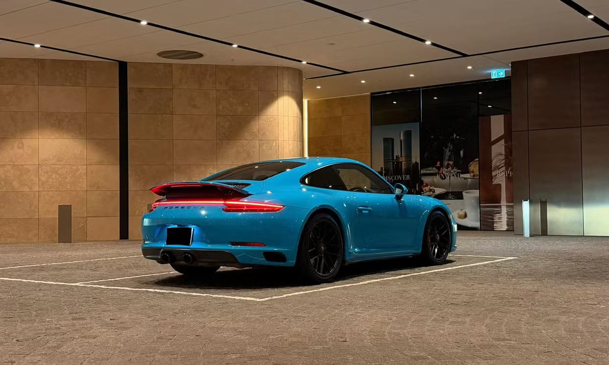 Blue Porsche 911 Carrera 4 GTS Coupe hire car in Melbourne, photo 2