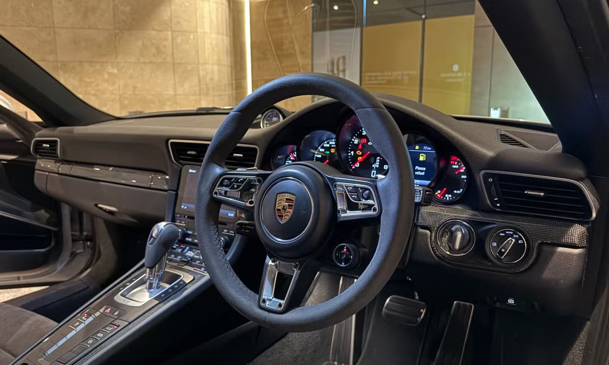 Blue Porsche 911 Carrera 4 GTS Coupe hire car in Melbourne, photo 4